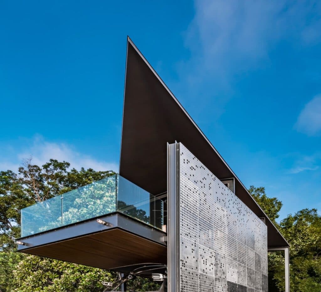 Matt Fajkus adds perforated steel screens to Austin boathouse